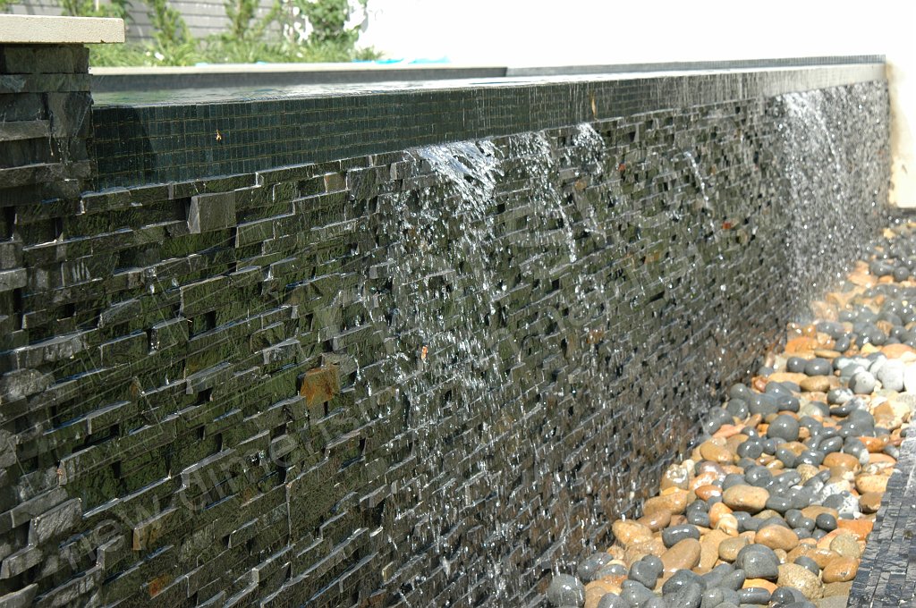 Norstone Charcoal Rock Panels used on the spillway of a large outdoor water feature